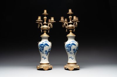 A pair of Chinese blue and white Nanking crackle-glazed vases with gilt bronze candelabra mounts, 19th C.