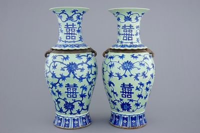 A pair of Chinese blue and white on celadon ground lotus scroll vases, 19th C.
