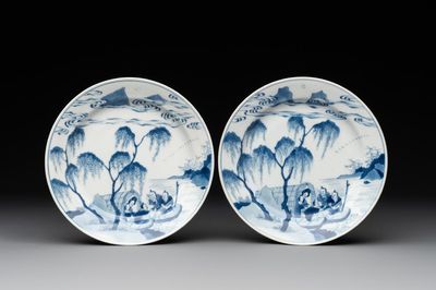 A pair of Chinese blue and white plates with a breastfeeding woman and fishermen on boats, Chenghua mark, Kangxi
