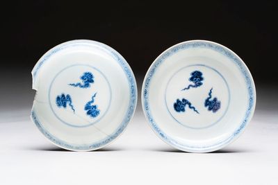 A pair of Chinese blue and white plates with clouds design, Xuande mark, 20th C.