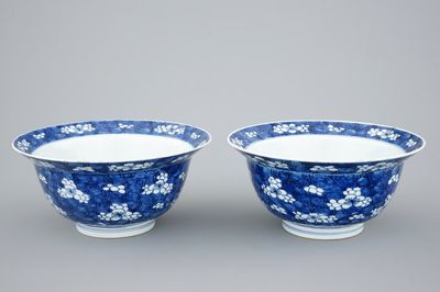 A pair of Chinese blue and white "Prunus on ice" klapmuts bowls, Kangxi