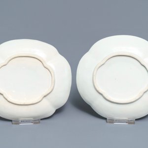 A pair of Chinese blue and white 'soft paste' relief-decorated cups and saucers, Qianlong — photo 2