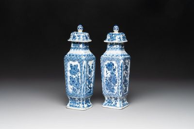 A pair of Chinese blue and white square vases and covers with floral design, Kangxi