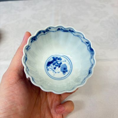 A pair of Chinese blue and white tea bowls and saucers — photo 18