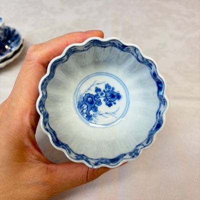 A pair of Chinese blue and white tea bowls and saucers — photo 22