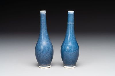 A pair of Chinese blue-glazed 'Hatcher Cargo' bottle vases with incised dragons, Transitional period