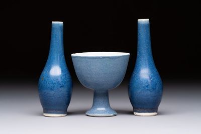A pair of Chinese blue-glazed 'Hatcher Cargo' vases with incised dragons and a stem cup, Transitional period