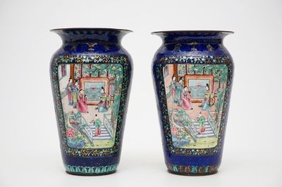 A pair of Chinese blue ground Canton enamel vases, 19th C.