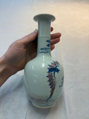 A pair of Chinese blue, white and copper-red 'bats among the clouds' vases, 19th C. — photo 13