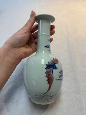 A pair of Chinese blue, white and copper-red 'bats among the clouds' vases, 19th C. — photo 5