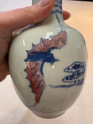 A pair of Chinese blue, white and copper-red 'bats among the clouds' vases, 19th C. — photo 8