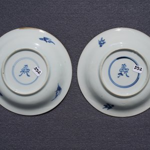 A pair of Chinese blue, white and underglaze red cups and saucers, Kangxi — photo 16