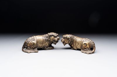 A pair of Chinese bronze Buddhist lions, 19/20th C.