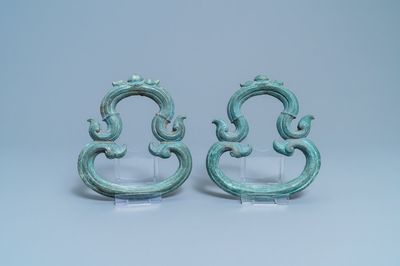 A pair of Chinese bronze ornaments, Han or later