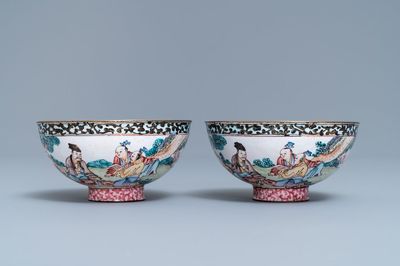 A pair of Chinese Canton enamel bowls with figures in a landscape, Yongzheng/Qianlong