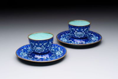 A pair of Chinese Canton enamel 'double happiness 囍' trembleuse cups and saucers, Qianlong/Jiaqing