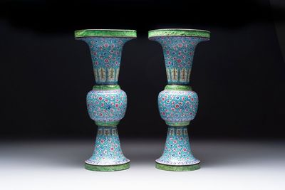 A pair of Chinese Canton enamel 'gu' vases with floral design, Qianlong