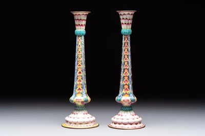 A pair of Chinese Canton enamel 'lotus' candlesticks, Yongzheng