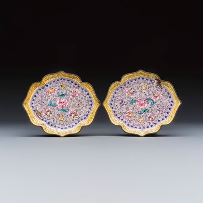 A pair of Chinese Canton enamel saucer dishes with floral design, Qianlong