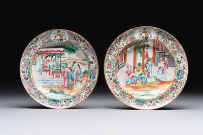 A pair of Chinese Canton famille rose armorial plates, 19th C.
