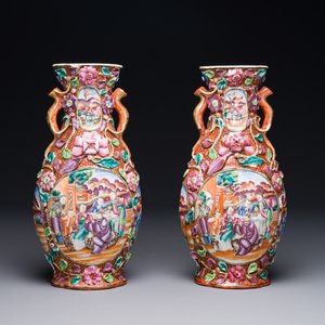 A pair of Chinese Canton famille rose 'mandarin subject' vases with floral relief design, Qianlong — 照片 1