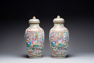 A pair of Chinese Canton famille rose vases and covers with narrative design, 19th C.