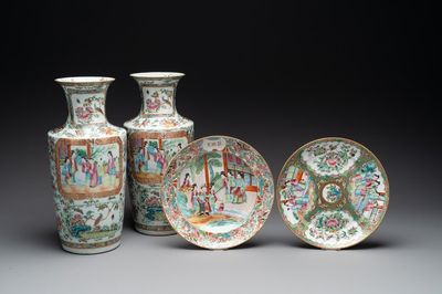 A pair of Chinese Canton famille rose vases and two plates, 19th C.