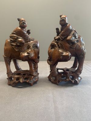 A pair of Chinese carved bamboo groups of a boy riding a buffalo, 19/20th C. — photo 1