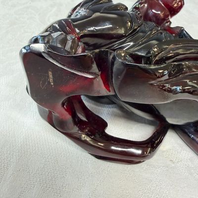 A pair of Chinese carved cherry amber 'Buddhist lions' groups — photo 12