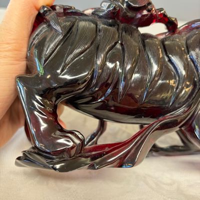 A pair of Chinese carved cherry amber 'Buddhist lions' groups — photo 23
