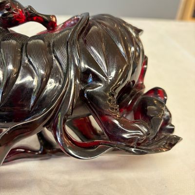 A pair of Chinese carved cherry amber 'Buddhist lions' groups — photo 24