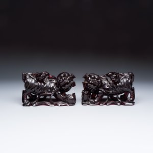 A pair of Chinese carved cherry amber 'Buddhist lions' groups — photo 2