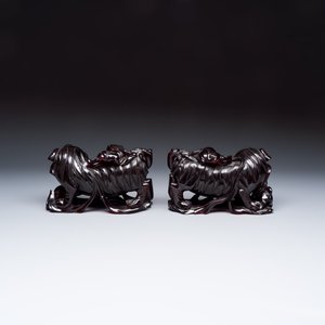 A pair of Chinese carved cherry amber 'Buddhist lions' groups — photo 4