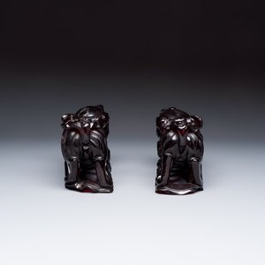 A pair of Chinese carved cherry amber 'Buddhist lions' groups — photo 5