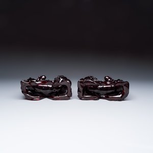 A pair of Chinese carved cherry amber 'Buddhist lions' groups — photo 7
