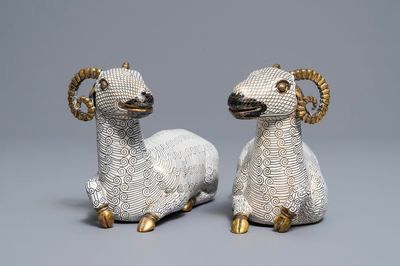 A pair of Chinese cloisonné and gilt bronze models of rams, Qianlong