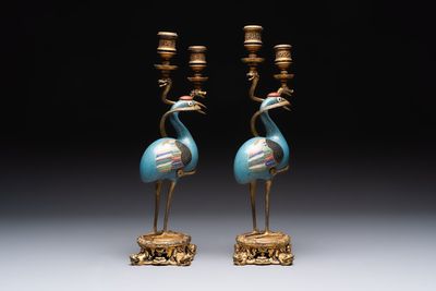 A pair of Chinese cloisonné cranes, later mounted as candelabras, 18th C.