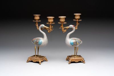 A pair of Chinese cloisonné cranes, later mounted as candelabras, 19th C.