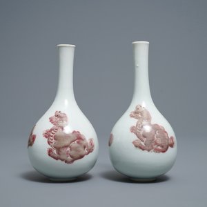 A pair of Chinese copper red 'mythical beasts' vases, Kangxi — photo 1