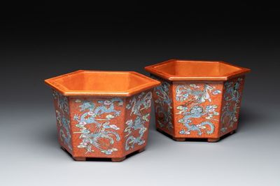A pair of Chinese coral-red-ground 'dragon and phoenix' jardinières, Qianlong mark, 19th C.