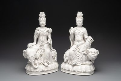A pair of Chinese Dehua blanc de Chine Bodhisattvas seated on an elephant and a Buddhist lion, 20th C.
