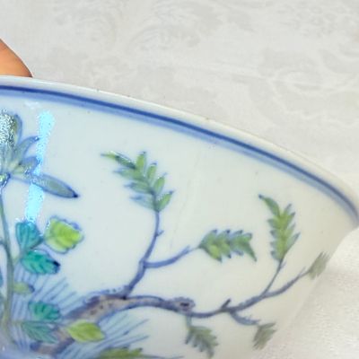 A pair of Chinese doucai bowls with floral design — photo 11