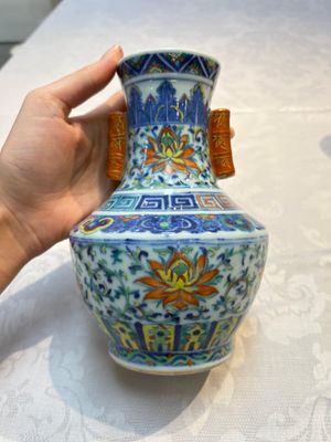A pair of Chinese doucai 'Hu' vases with lotus scroll design, Qianlong mark, 19th C. — photo 11