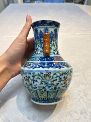 A pair of Chinese doucai 'Hu' vases with lotus scroll design, Qianlong mark, 19th C. — photo 2