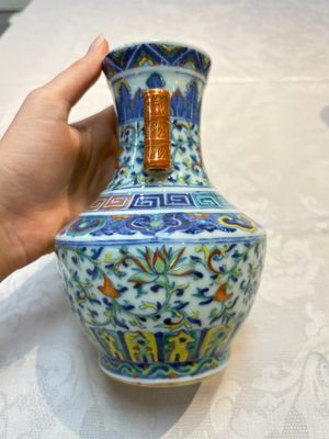 A pair of Chinese doucai 'Hu' vases with lotus scroll design, Qianlong mark, 19th C. — photo 10