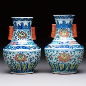 A pair of Chinese doucai 'Hu' vases with lotus scroll design, Qianlong mark, 19th C. — photo 1