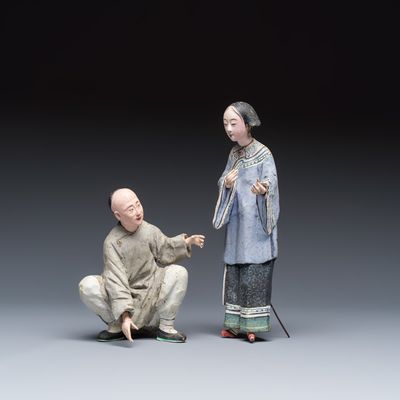 A pair of Chinese export painted unfired clay figures, Qing