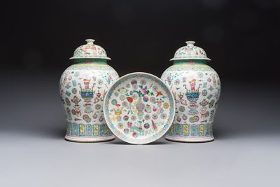 A pair of Chinese famille rose 'Antiquities' covered vases and a dish, 19th C.