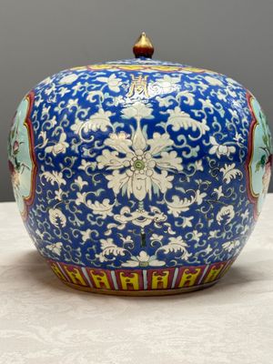A pair of Chinese famille rose 'Birds among Flowering Branches' jars and covers — photo 16