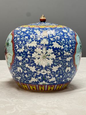 A pair of Chinese famille rose 'Birds among Flowering Branches' jars and covers — photo 18